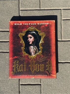 Kat Von D Red and Gold 'High Voltage Tattoo' Art Book Cover
